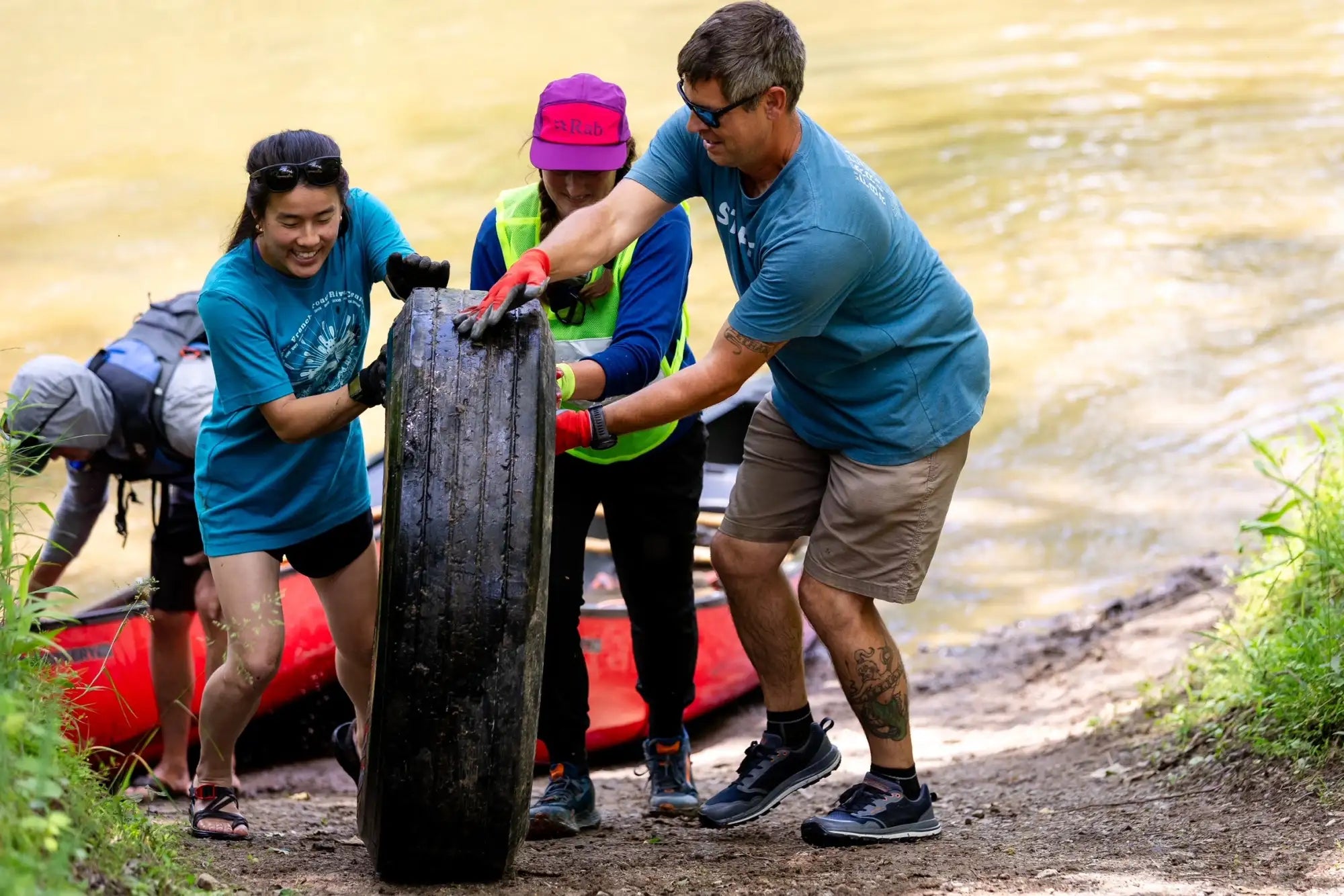 Black rubber tire with visible tread and sidewall markings